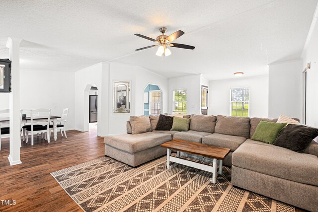 5568 N NC Highway 58, Nashville, NC 27856 - living area with wood finished floors, a ceiling fan, and arched walkways