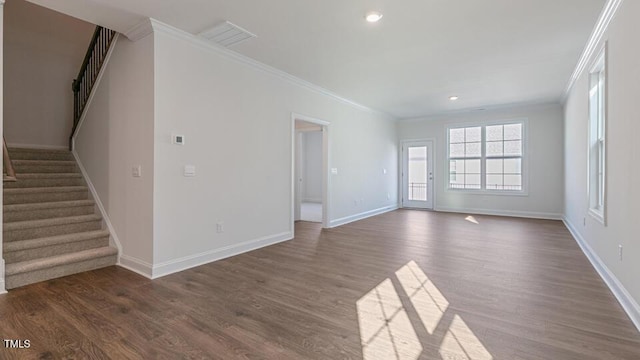 2304 Sugar Cone Way, Fuquay Varina, NC 27526 - unfurnished living room with ornamental molding, stairway, dark wood finished floors, and recessed lighting