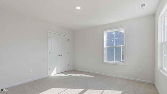 2304 Sugar Cone Way, Fuquay Varina, NC 27526 - unfurnished room featuring light colored carpet and healthy amount of natural light