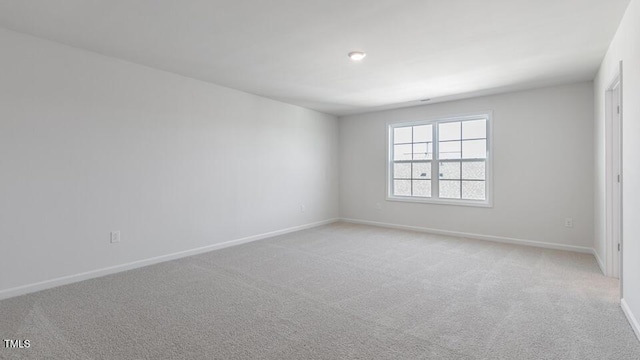 2304 Sugar Cone Way, Fuquay Varina, NC 27526 - empty room with baseboards and light colored carpet