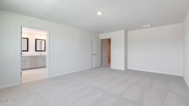 2304 Sugar Cone Way, Fuquay Varina, NC 27526 - unfurnished bedroom with light colored carpet and ensuite bathroom