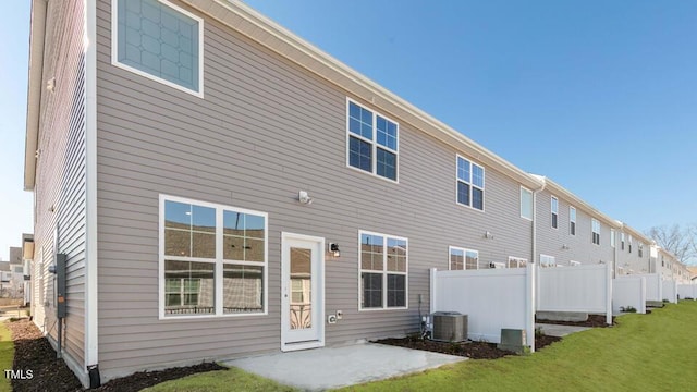 2304 Sugar Cone Way, Fuquay Varina, NC 27526 - rear view of house with a patio