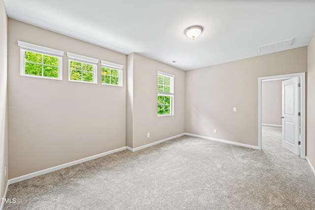 677 Wickham Ridge Rd, Apex, NC 27539 - carpeted empty room featuring baseboards