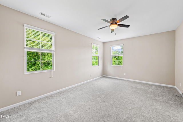 677 Wickham Ridge Rd, Apex, NC 27539 - carpeted spare room with baseboards and ceiling fan