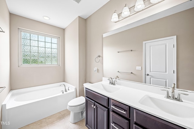 677 Wickham Ridge Rd, Apex, NC 27539 - bathroom featuring double vanity, a garden tub, and tile patterned floors