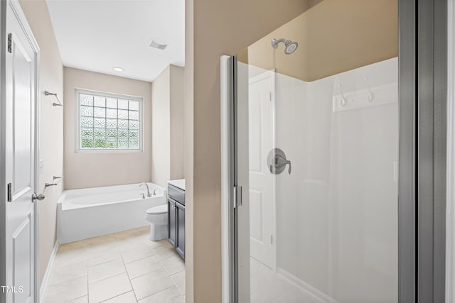 677 Wickham Ridge Rd, Apex, NC 27539 - bathroom featuring a shower stall, a garden tub, vanity, and tile patterned floors