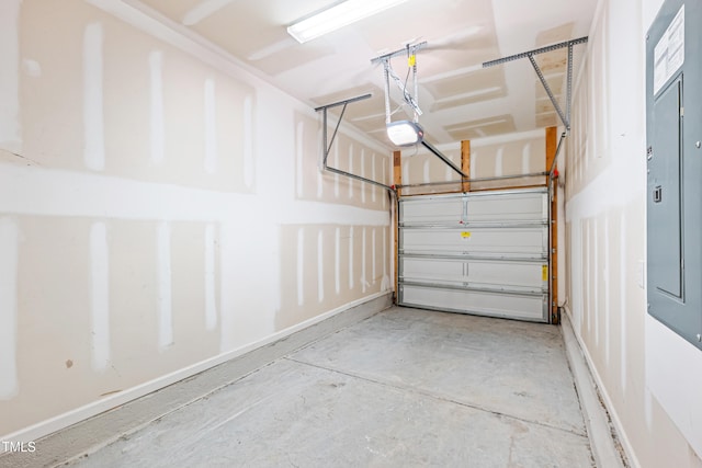 677 Wickham Ridge Rd, Apex, NC 27539 - garage with a garage door opener and baseboards