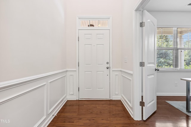 4 Seawell Ct, Durham, NC 27703 - entryway with a wainscoted wall, dark wood-style flooring, and a decorative wall