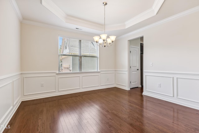 4 Seawell Ct, Durham, NC 27703 - empty room with a raised ceiling, a chandelier, wood finished floors, crown molding, and a wainscoted wall