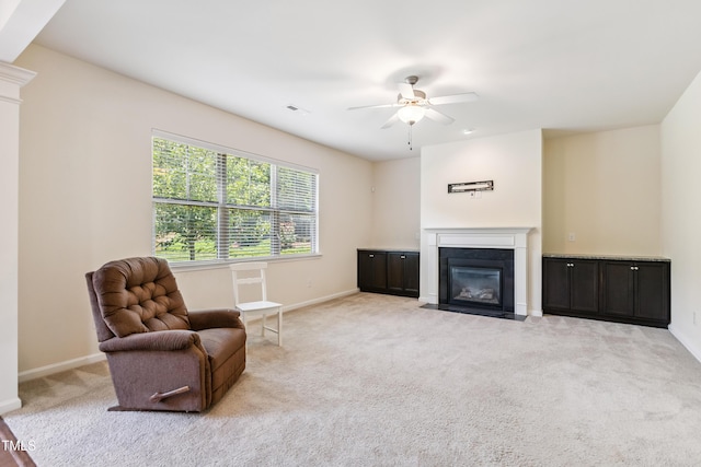 4 Seawell Ct, Durham, NC 27703 - living area with a ceiling fan, a fireplace with flush hearth, and carpet