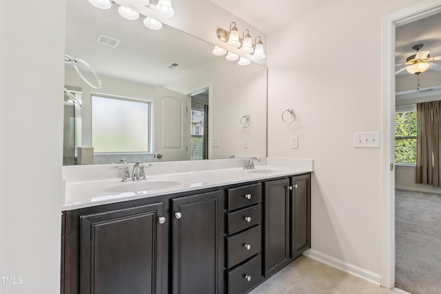 4 Seawell Ct, Durham, NC 27703 - bathroom with double vanity, tile patterned flooring, and a ceiling fan