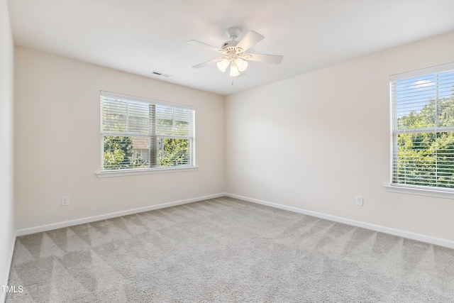 4 Seawell Ct, Durham, NC 27703 - spare room featuring carpet flooring and a ceiling fan