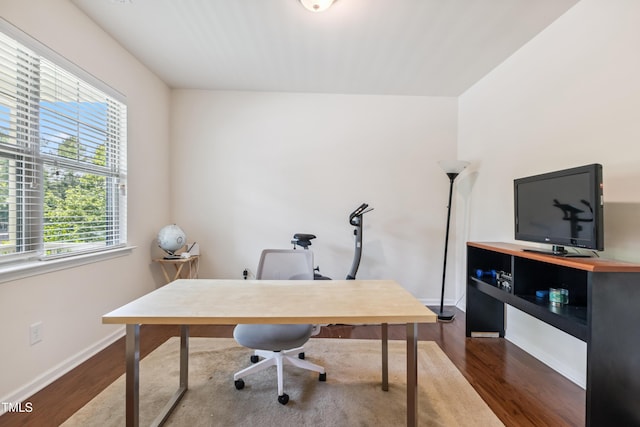 4 Seawell Ct, Durham, NC 27703 - office featuring dark wood-style flooring and baseboards