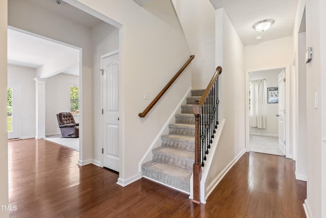 4 Seawell Ct, Durham, NC 27703 - stairs featuring wood finished floors and baseboards