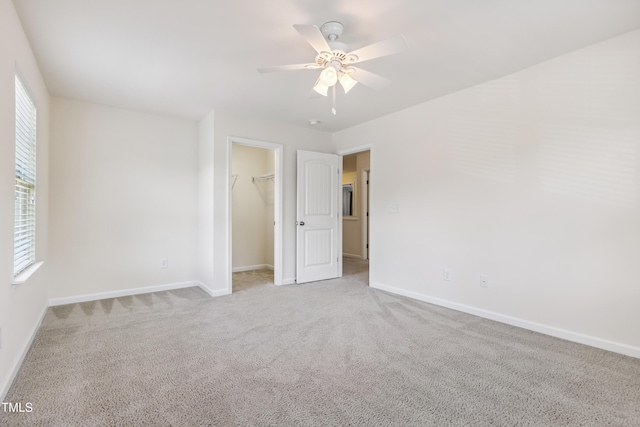 4 Seawell Ct, Durham, NC 27703 - unfurnished bedroom with multiple windows, carpet flooring, and a spacious closet