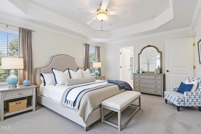 4 Seawell Ct, Durham, NC 27703 - bedroom with a raised ceiling, light colored carpet, ornamental molding, and ceiling fan