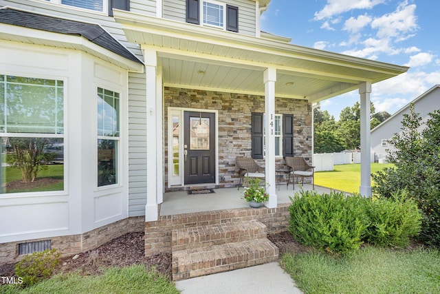 141 Vibernum Vw, Four Oaks, NC 27524 - view of exterior entry with a porch and stone siding