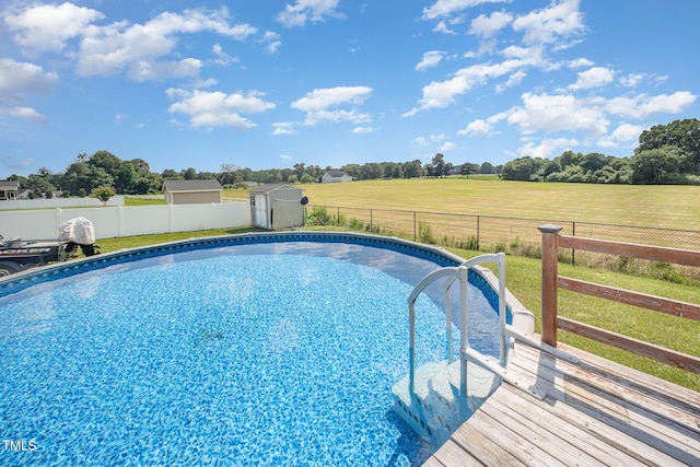 141 Vibernum Vw, Four Oaks, NC 27524 - view of swimming pool featuring a fenced backyard and a storage unit