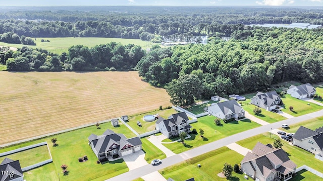 141 Vibernum Vw, Four Oaks, NC 27524 - aerial perspective of suburban area featuring a forest