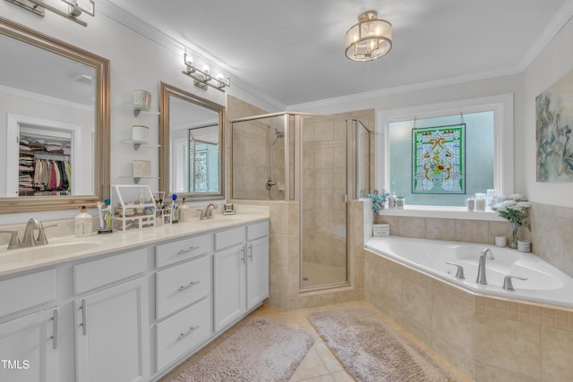 126 Gwendolyn Way, Fuquay Varina, NC 27526 - full bathroom featuring a stall shower, a garden tub, double vanity, tile patterned floors, and crown molding