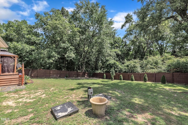 126 Gwendolyn Way, Fuquay Varina, NC 27526 - fenced backyard with a gazebo