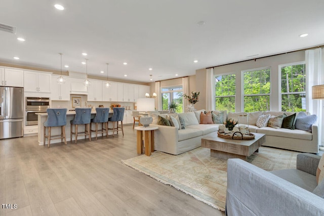 3010 Shady Sage Way Lot 15, Apex, NC 27523 - living area with light wood finished floors and recessed lighting