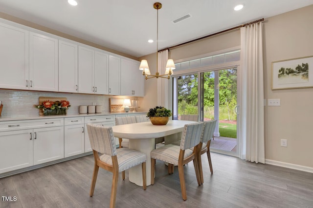 3010 Shady Sage Way Lot 15, Apex, NC 27523 - dining space with a chandelier, recessed lighting, and light wood-style floors