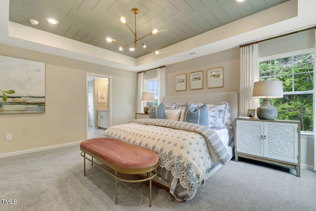 3010 Shady Sage Way Lot 15, Apex, NC 27523 - carpeted bedroom with a raised ceiling, wooden ceiling, and a chandelier
