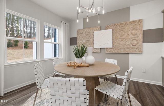 1001 Jensen Rd, Durham, NC 27703 - dining space with wood finished floors and a chandelier