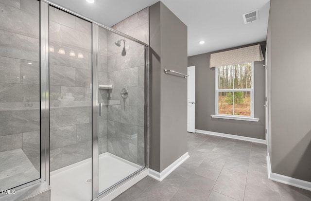 1001 Jensen Rd, Durham, NC 27703 - bathroom featuring a shower stall, tile patterned floors, and recessed lighting