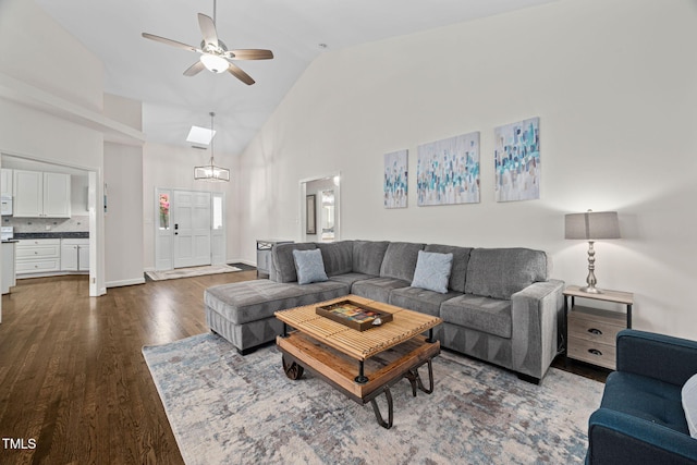 316 Boltstone Ct, Cary, NC 27513 - living room with dark wood finished floors, high vaulted ceiling, and a ceiling fan