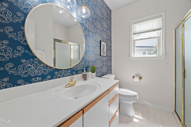 316 Boltstone Ct, Cary, NC 27513 - bathroom featuring wallpapered walls, a stall shower, vanity, and tile patterned flooring