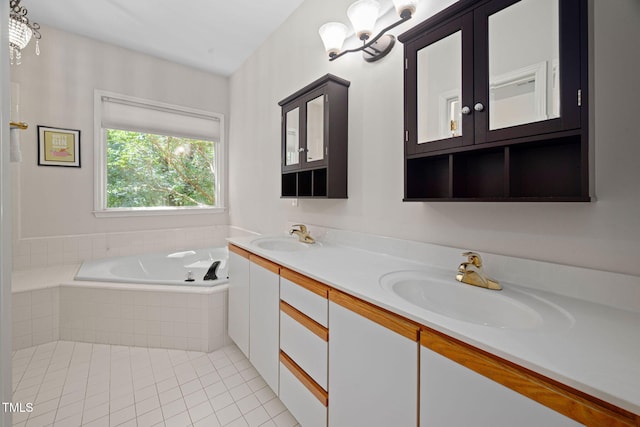 316 Boltstone Ct, Cary, NC 27513 - bathroom with a chandelier, tile patterned floors, double vanity, and a garden tub