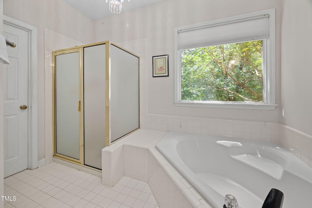 316 Boltstone Ct, Cary, NC 27513 - bathroom with a shower stall, a bath, and tile patterned floors