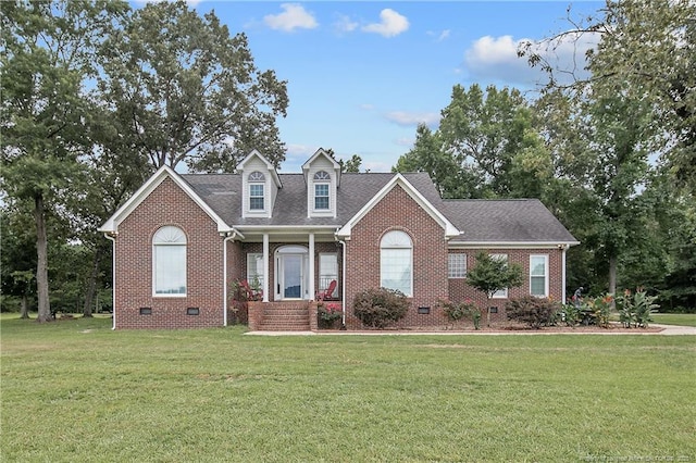 7655 Lucinda Ln, Linden, NC 28356 - view of front of home featuring brick siding, a front lawn, and crawl space