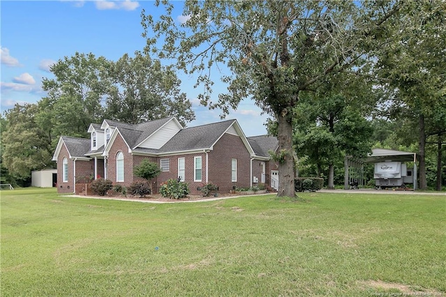 7655 Lucinda Ln, Linden, NC 28356 - view of front of home featuring brick siding, a front yard, and a carport