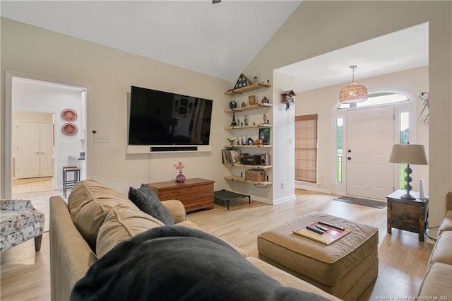 7655 Lucinda Ln, Linden, NC 28356 - living area with light wood finished floors and high vaulted ceiling