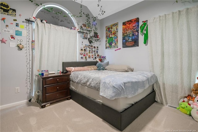 7655 Lucinda Ln, Linden, NC 28356 - bedroom with lofted ceiling and carpet