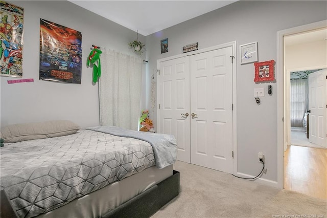 7655 Lucinda Ln, Linden, NC 28356 - bedroom featuring a closet and light carpet