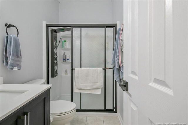 7655 Lucinda Ln, Linden, NC 28356 - full bathroom featuring a stall shower, vanity, and tile patterned flooring