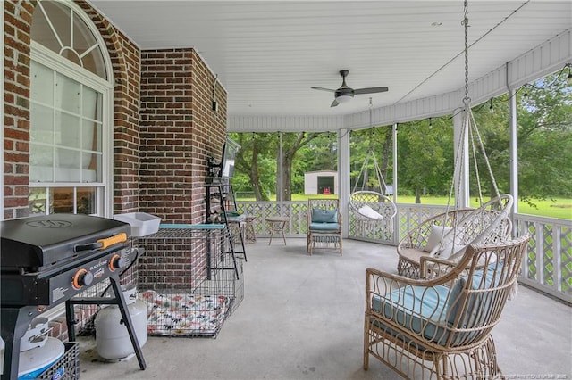 7655 Lucinda Ln, Linden, NC 28356 - covered porch featuring area for grilling and ceiling fan