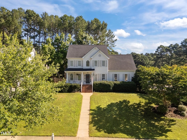 513 Moultonboro Ave, Wake Forest, NC 27587 - view of front of home with a porch and a front lawn
