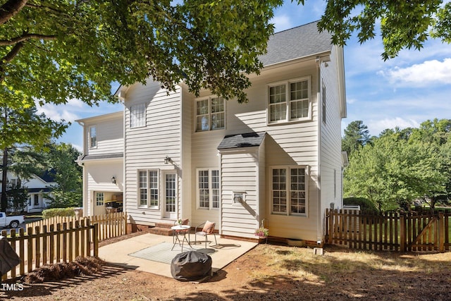 513 Moultonboro Ave, Wake Forest, NC 27587 - back of house with a patio area and roof with shingles