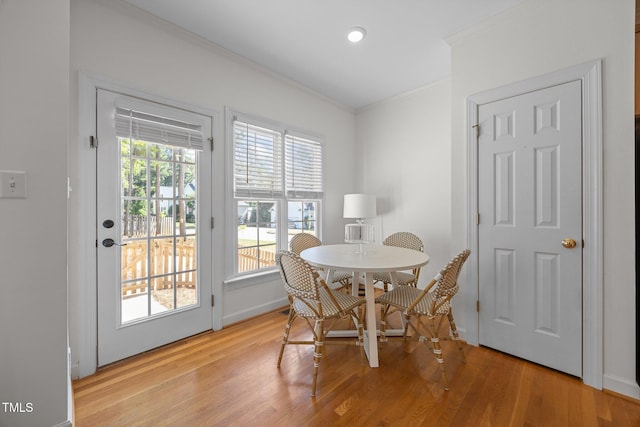 513 Moultonboro Ave, Wake Forest, NC 27587 - dining room featuring crown molding, light wood-type flooring, and recessed lighting