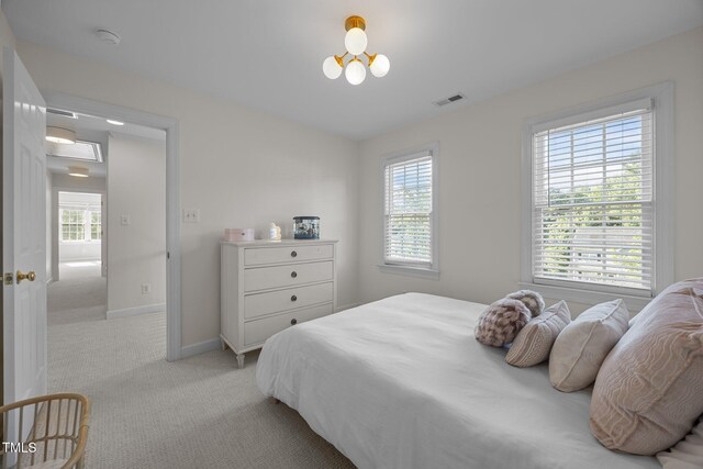 513 Moultonboro Ave, Wake Forest, NC 27587 - bedroom featuring light colored carpet and baseboards