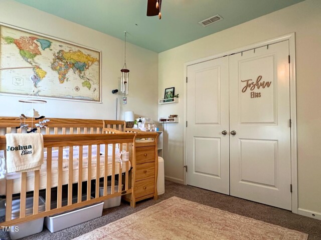 505 Poplar St, Durham, NC 27703 - carpeted bedroom with a nursery area, a closet, and ceiling fan