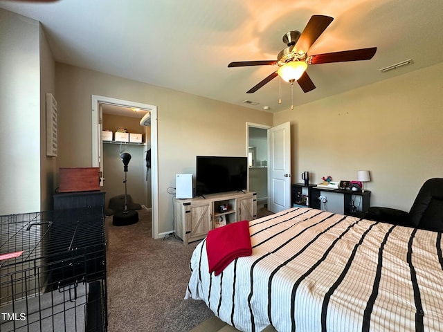 505 Poplar St, Durham, NC 27703 - carpeted bedroom featuring a spacious closet and ceiling fan