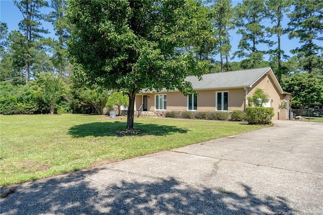 116 Bledsoe St, Hope Mills, NC 28348 - ranch-style home with a front lawn and concrete driveway