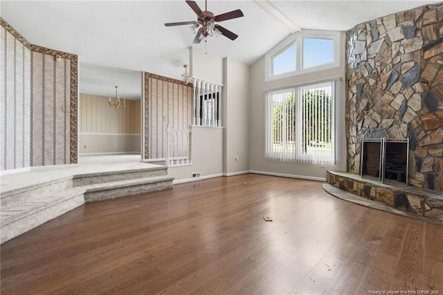 116 Bledsoe St, Hope Mills, NC 28348 - unfurnished living room with a ceiling fan, a chandelier, wood finished floors, a fireplace, and high vaulted ceiling