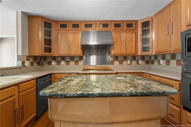 116 Bledsoe St, Hope Mills, NC 28348 - kitchen with wall chimney range hood, dishwasher, a center island, a textured ceiling, and decorative backsplash